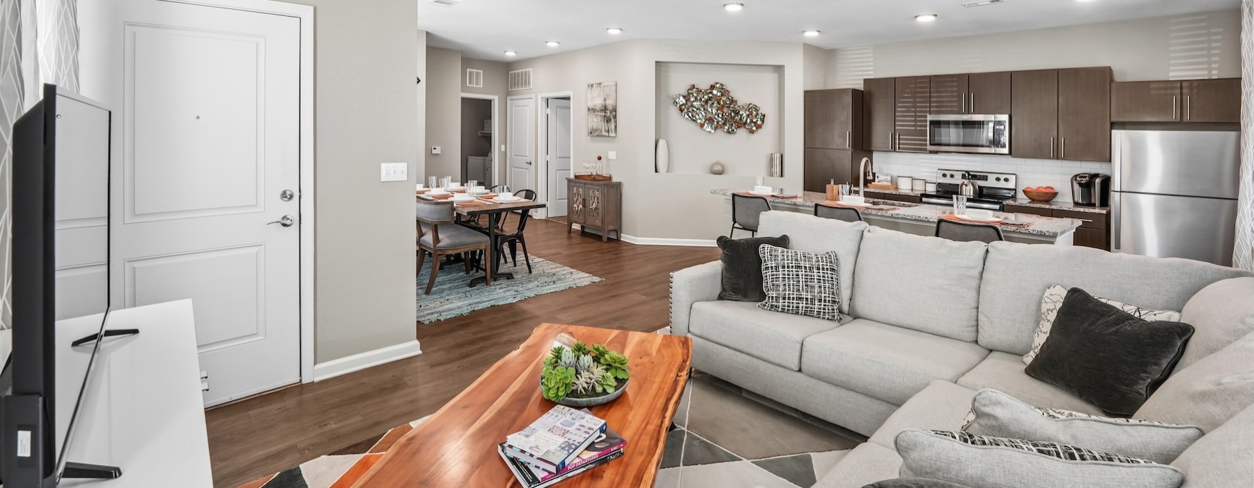 a living room with a couch and a table